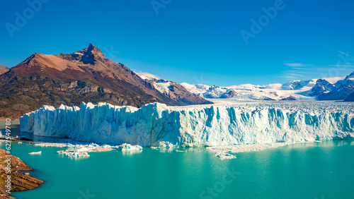 Canvas Print Panoramic over big Perito Moreno glacier in Patagonia with blue sky and turquois