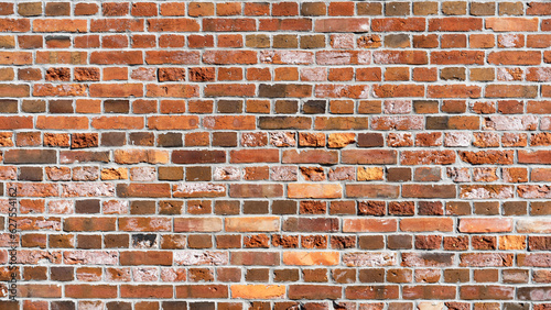 Red grunge brick wall. Brick wall texture. 
