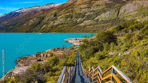 El Calafate, Argentina - Lago Argentino and walking path, near Perito Moreno glacier in Patagonia with blue sky and turquoise water, South America,in Autumn colors