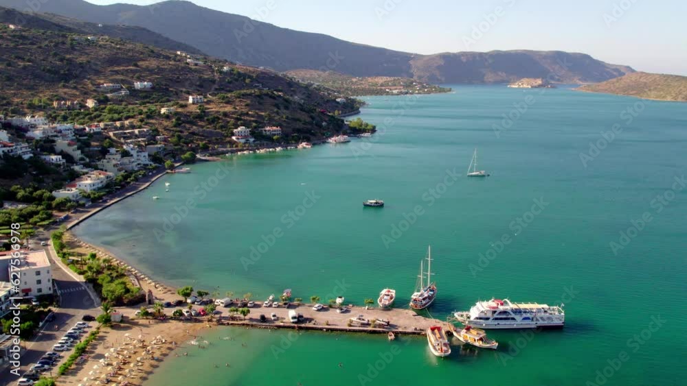 Aerial view of Agios Nikolaos beach in Crete, Greece. Aerial view of Agios Nikolaos beach in Crete, Greece.