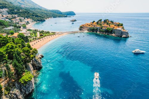 Beautiful beach and Sveti Stefan island near Budva, Montenegro. Luxury resort at Adriatic sea.