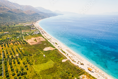 Albania riviera. Beach on coast of Ionian Sea in Albania, lukove, near Greece island Korfu. Borsh beach photo