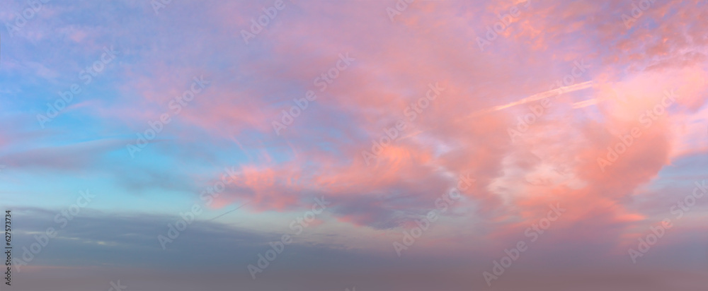 Obraz premium Romantic pink clouds in the dawn sky. Tender mood Sunrise Sundown Sunset sky panorama