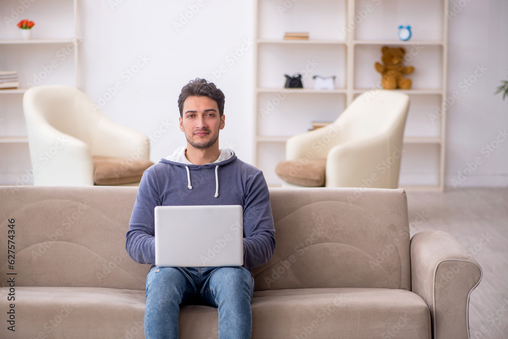 Young male freelancer working from home Young male freelancer working from home