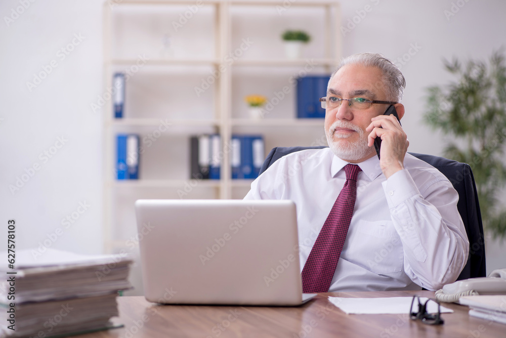 Old male employee and too much work in the office