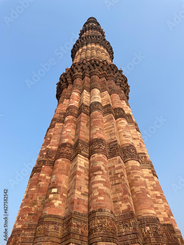 Below angle of famous monument Qutub Minar. A historical Mogul structure- Kutub Minar situated at Delhi,  India.