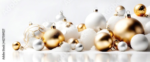 Winter holiday wallpaper. Festive white and gold Christmas ornaments and baubles. Empty glass snow ball White Christmas