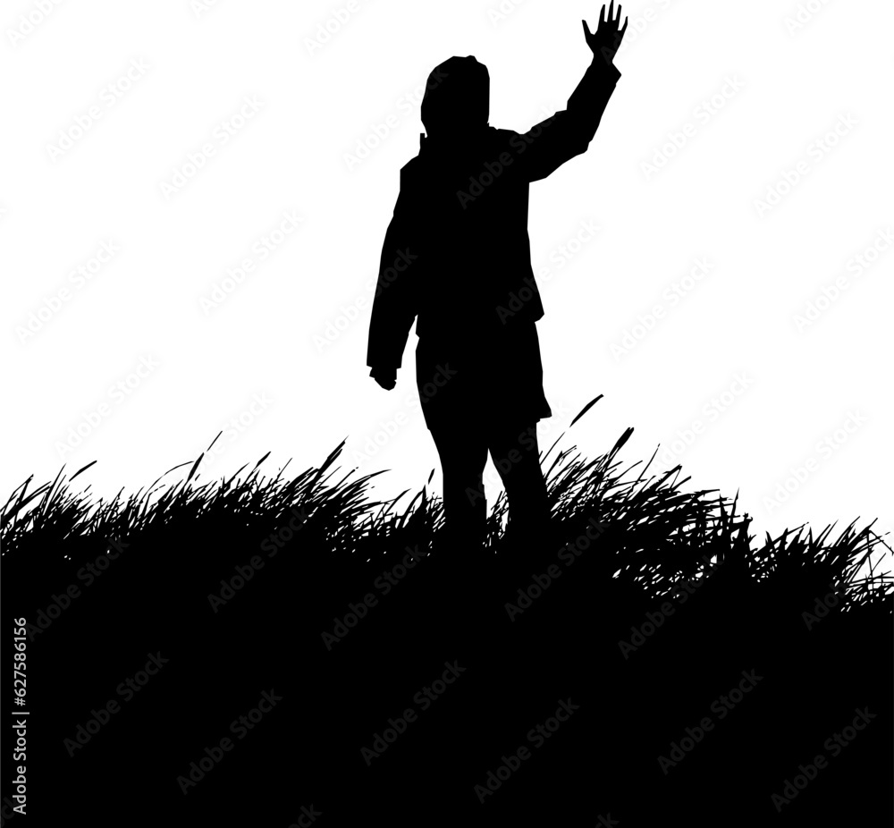 Silhouette eines Jungen mit Grass auf einer Düne Silhouette eines Jungen mit Grass auf einer Düne