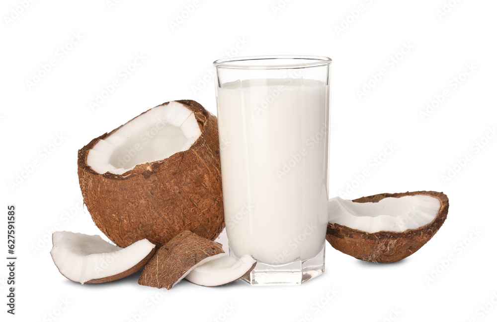 Glass of delicious vegan milk and coconut pieces on white background Glass of delicious vegan milk and coconut pieces on white background