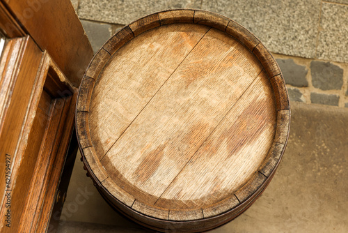 Traditional wooden barrel outdoors, top view. Wine making