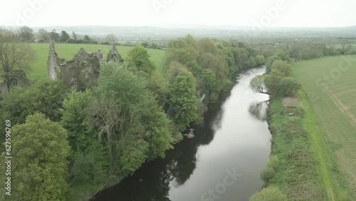 Enchanting River Blackwater flowing by ruins of Dromaneen Castle Cork Ireland photo