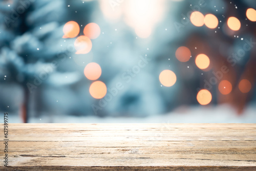 Empty wooden table for present product on christmas tree and bokeh blur background.