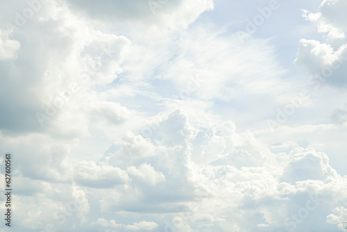 Fototapeta Naklejka Na Ścianę i Meble -  Heavenly Skies: White and Blue Fluffy Clouds