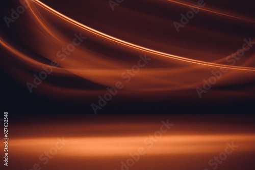 Long exposure. Abstract wallpaper with dark background. Glowing dynamic lines over dark background. Light drawing trajectory.