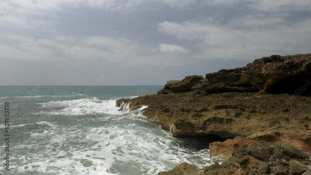 Surf on the stones of the Mediterranean coast. Big wave with high splash. High quality 4k footage Surf on the stones of the Mediterranean coast. Big wave with high splash. High quality 4k footage