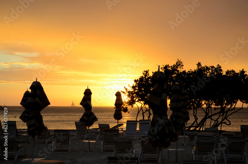 Beach Resort Silhouetted at Sunset in Aruba © dejavudesigns
