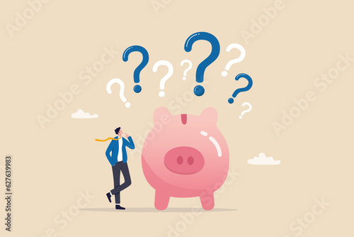 Finance question or saving problem, doubt or confusion, banking or economic uncertainty, contemplation or money solution, wealth concept, confused businessman with piggybank and question marks.