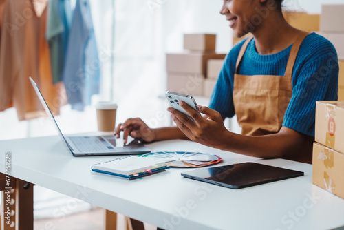 Pretty African American sme business woman working Custom Ecommerce Packaging leading supplier of custom packaging. create a personalised experience, fast production and competitive pricing