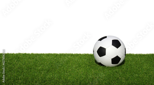 Soccer ball on green grass © Alekss