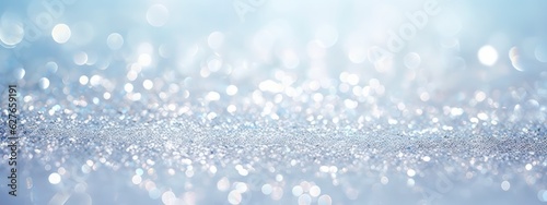 Glitter background in pastel delicate silver light blue and white tones de-focused