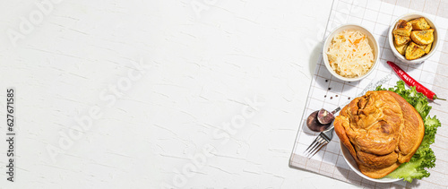 Wallpaper Mural Traditional Oktoberfest smoked pork knuckle eisbein, fermented sour cabbage and baked spices potato Torontodigital.ca