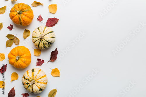 Autumn composition. Pattern made of dried leaves and other design accessories on table. Flat lay, top view