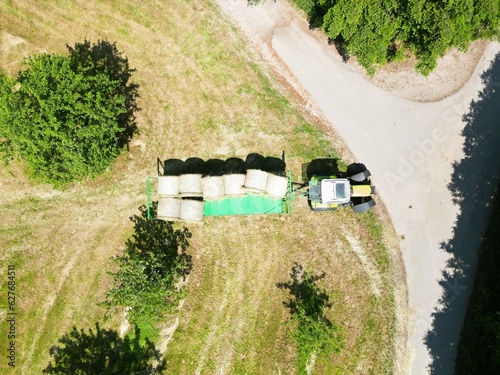 Working in the field on a tractor, harvesting
