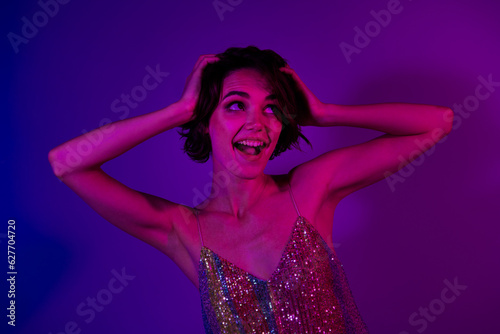Photo of stunning gorgeous lady touch head hair look empty space enjoy 14 february prom event isolated bright neon color background