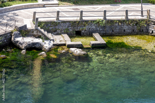 Old City Walls with path over the water leading to Gurdic Gate (South Gate), Kotor, Montenegro photo