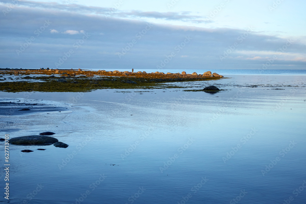 Northern seascape. Tersky coast of the White Sea. Murmansk region, Russia. The White Sea coast in Karelia in summer. Northern seascape. Tersky coast of the White Sea. Murmansk region, Russia. The White Sea coast in Karelia in summer.