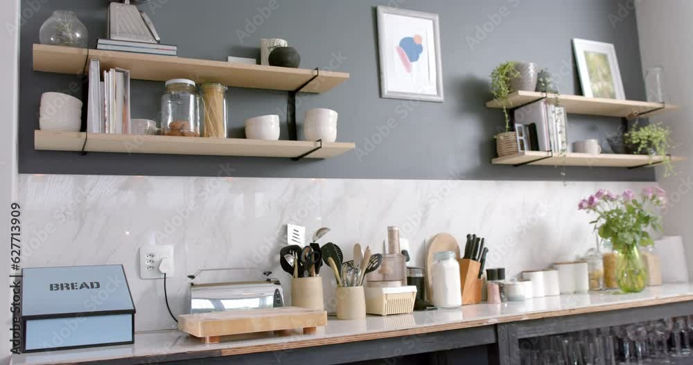 Close up of sunny kitchen with plants and flowers, slow motion Close up of sunny kitchen with plants and flowers, slow motion