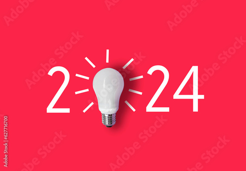 happy new year 2024. year 2024 with light bulb. creativity inspiration ,planning ideas concept 