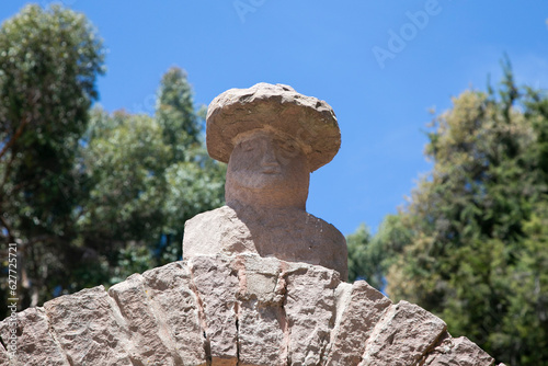 Stone heads carved into the arches on the island of Taquile on Lake Titicaca in Peru.