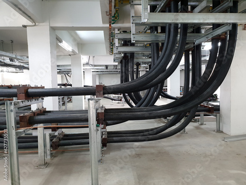 115kV High voltage power cable (XLPE) installation in cable room of substation photo