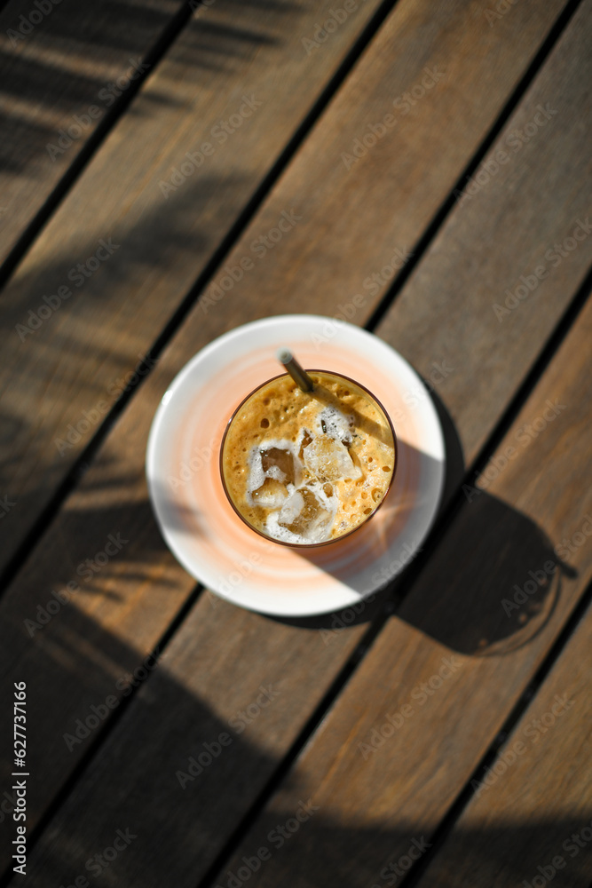 Glass of a iced coffee. Cold brew coffee drink with ice. Glass of a iced coffee. Cold brew coffee drink with ice.