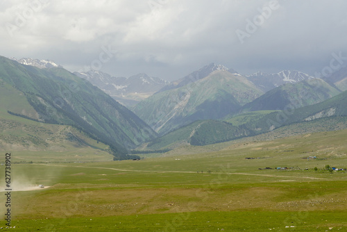Semenovskoye Grigorevskoye Canyon mountains and green valley Kyrgystan near Issyk Kul. High quality photo