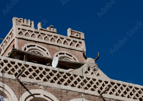 In Yemen, ibex horns fixed on walls and roofs are meant to protect the house and the family living in it from malefic spirits; photo