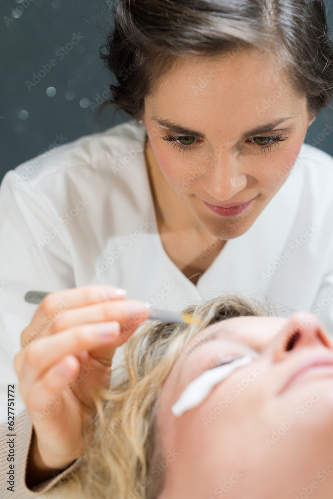 Naklejka premium facial beautification procedure