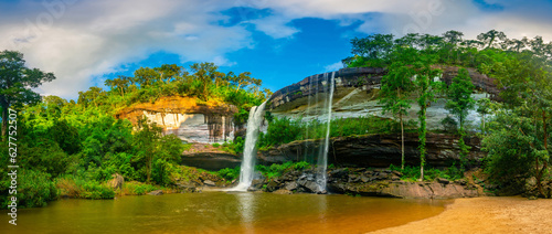 Panorama view of Native picturesque waterfall Big Waterfall in deep forest   Huai Luang Waterfal Ubon Ratchathani  Thailand  is popular with waterfall tourists.leaf moving low speed shutter blur.