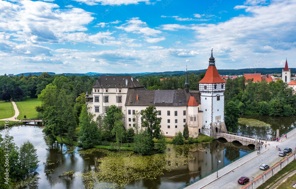 Blatna castle near Strakonice, Southern Bohemia, Czech Republic. Aerial view of medieval Blatna water castle surrounded parks and lakes, Blatna, South Bohemian Region, Czech Republic.