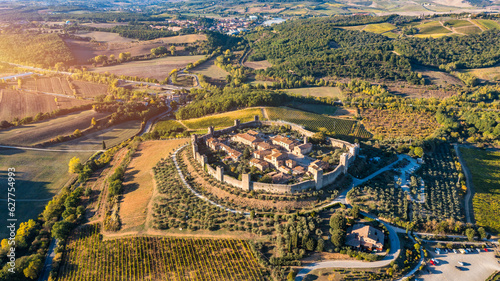 Beautiul aerial view of Monteriggioni, Tuscany medieval town on the hill. Tuscan scenic landscape vista with ancient walled city Monteriggioni, Italy. photo