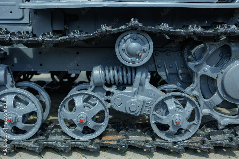 Agricultural machinery and wheel on a sunny day. Texture, background for design.