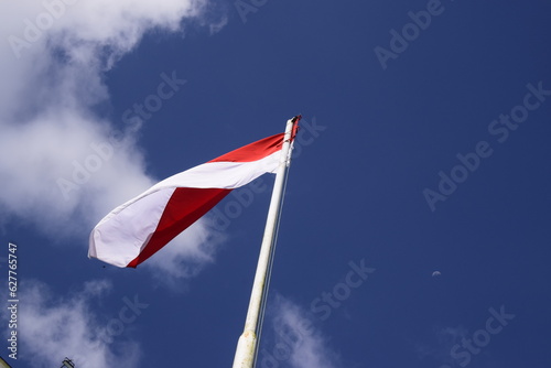 indonesian flag with blue sky