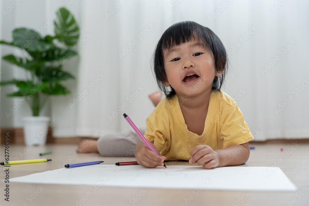 Happy Asia children playing learning paint on paper. Activity, development, IQ, EQ, meditation, brain, muscles, essential skills, family having fun spending time together. Holiday Happy Asia children playing learning paint on paper. Activity, development, IQ, EQ, meditation, brain, muscles, essential skills, family having fun spending time together. Holiday