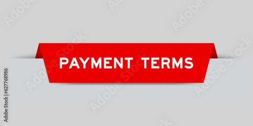 Red color inserted label with word payment terms on gray background