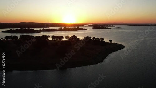 Alentejo lake in Portugal in the province of Alqueva boarder the municipalities of Portel, Moura, Reguengos de Monsaraz, Mourão and Alandroal - The largest artificial lake in Europe photo