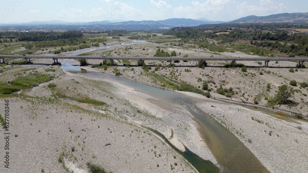 Europe, Italy , Emilia Romagna Val Trebbia - drone aerial view of river drought and aridity water emergency - climate change and global warming after hurricane and river flood