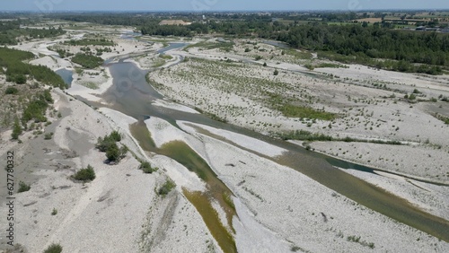 Obraz na płótnie Europe, Italy , Emilia Romagna Val Trebbia - drone aerial view of river drought and aridity water emergency - climate change and global warming after hurricane and river flood w salonie