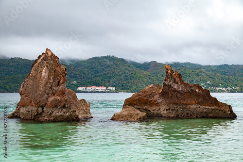 Samana bay landscape with two sharp coastal rocks