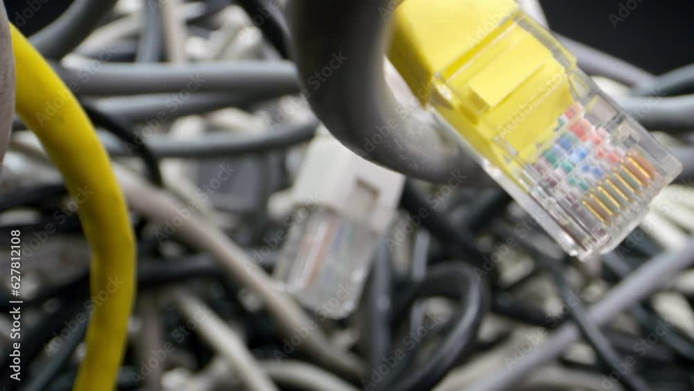 The camera plunges into the maze of network cables and other obstacles. Disorganized cables and numerous computer problems create an opaque situation. The camera plunges into the maze of network cables and other obstacles. Disorganized cables and numerous computer problems create an opaque situation.